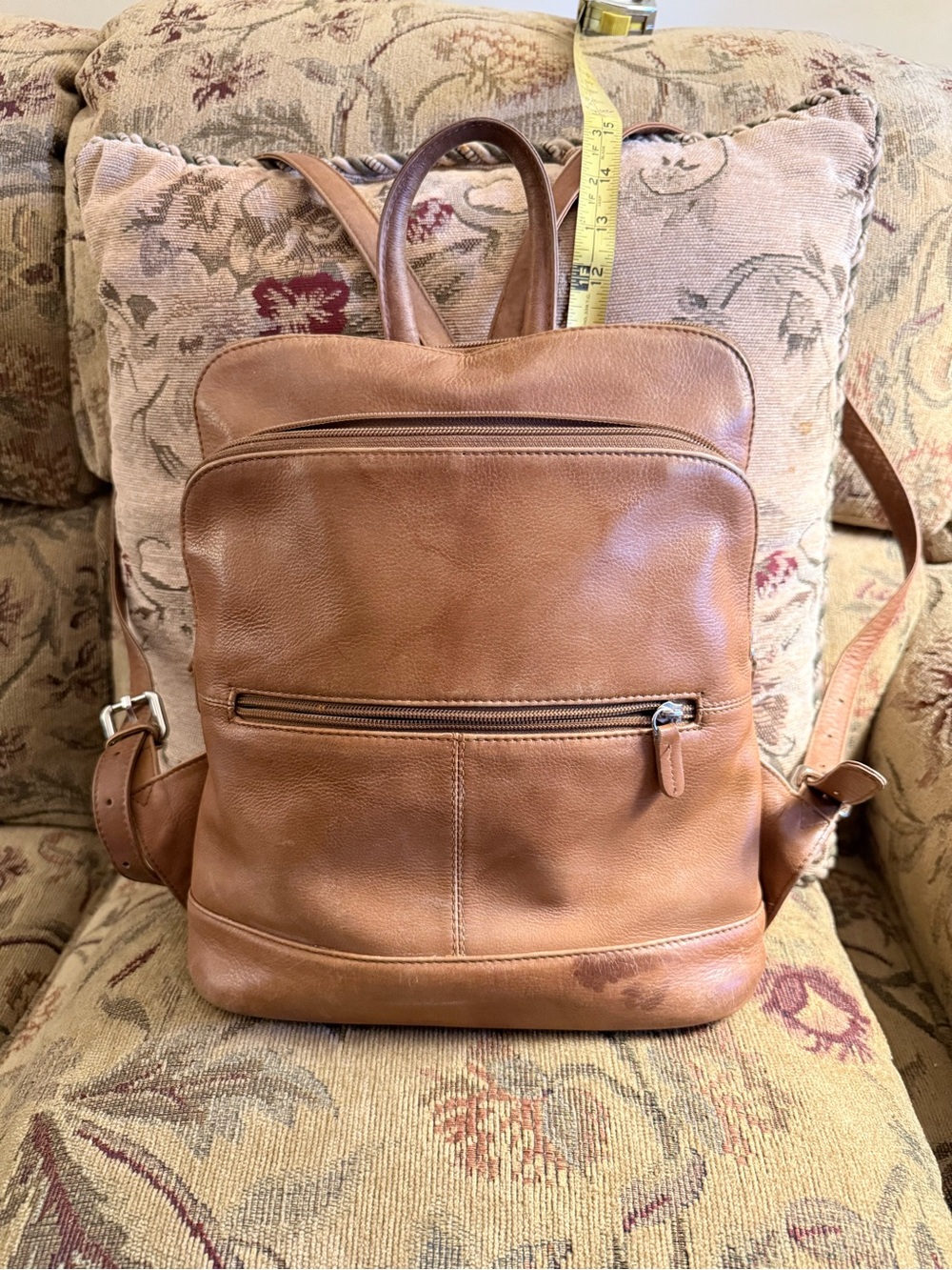 ili cognac/tan leather backpack